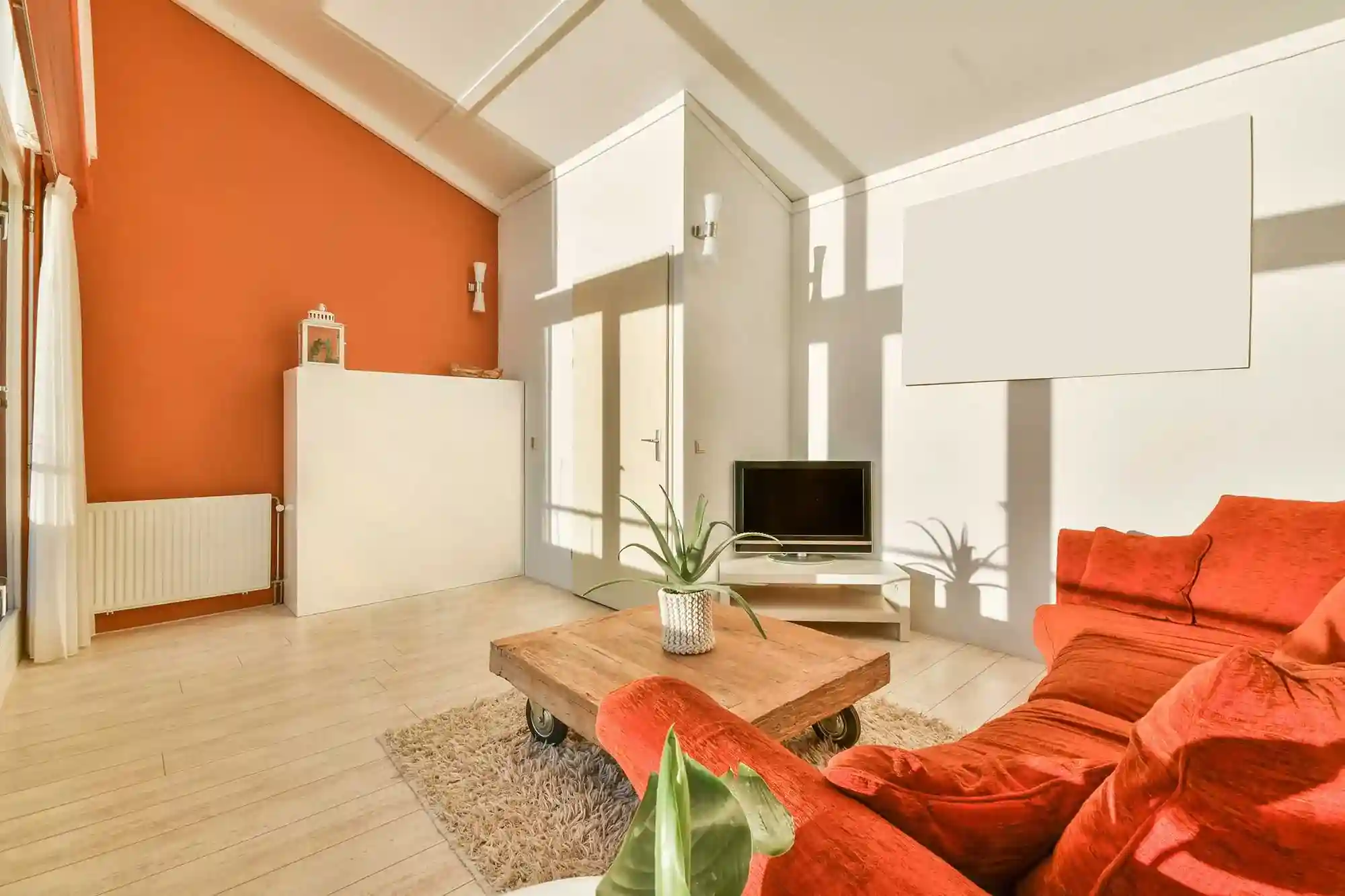 Modern living room interior built by CityGCon with warm lighting and clean finishes.