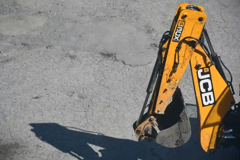 Excavation services crane moving soil on a Brooklyn construction site