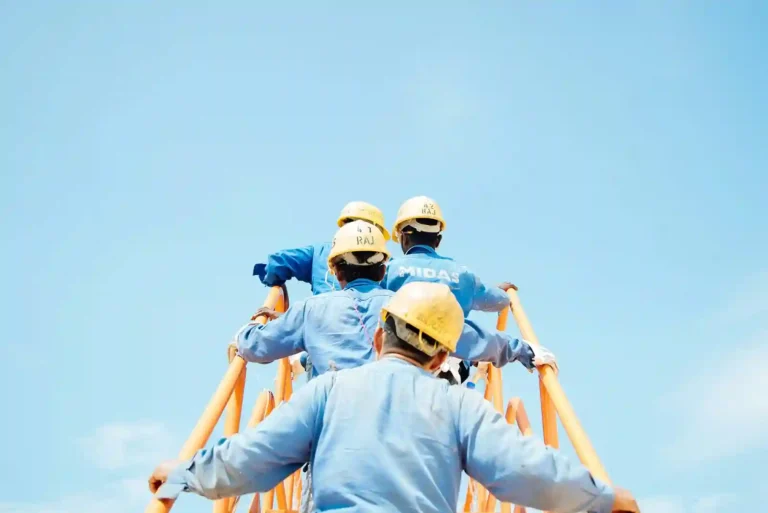 CityGCon commercial construction workers climbing stairs on Brooklyn NY site